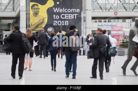 Hannover, Germany. 11th June, 2018. Visitors arrive at the digital fair 'Cebit'. Cebit is attempting a new 'festival' format after three decades, taking place between the 11th and the 15th of June. Photo: Julian Stratenschulte/dpa Credit: dpa picture alliance/Alamy Live News Stock Photo