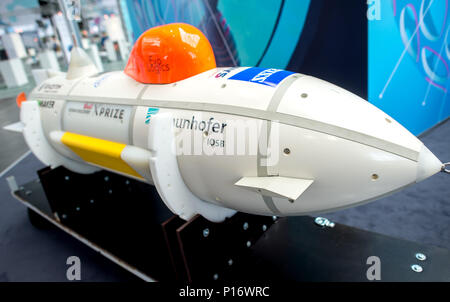 Hannover, Germany. 11th June, 2018. An autonomous underwater vehicle that is able to map the sea ground at the stand of the Fraunhofer Society at the digital fair 'Cebit'. Cebit is attempting a new 'festival' format after three decades, taking place between the 11th and the 15th of June. Photo: Hauke-Christian Dittrich/dpa Credit: dpa picture alliance/Alamy Live News Stock Photo