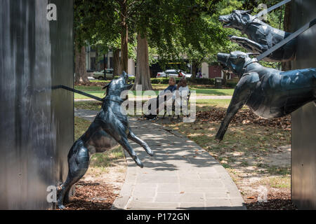 Police and Dog Attack sculpture by James Drake in Birmingham, AL depicting ferocious attack dogs used by police during a 1963 civil rights protest.