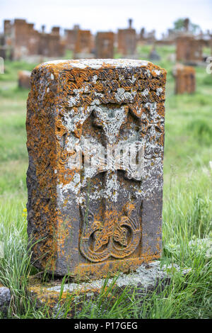 Ancient Armenian khachkar stone cross on a rural cemetery near Dilijan National Park. Lake Sevan, Armenia. Stock Photo