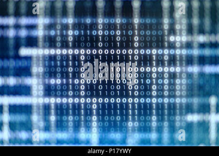 binary code data bit screen display on laptop computer screen. matrix of data flow. Rise of the big data AI age. artificial intelligence data transfer Stock Photo