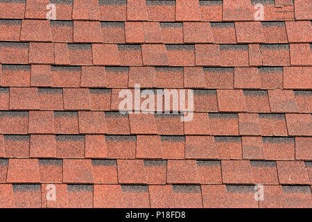 Brown shingle roof tiles pattern background with rough texture Stock Photo