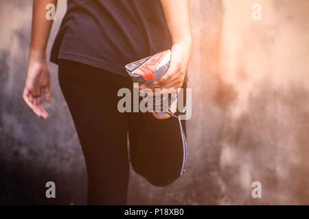 Women who are warming up before running. Stock Photo