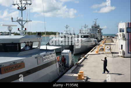 161005-N-SX614-085  KEY WEST, Florida (October 5, 2016) Nine ships from the Royal Bahamas Defence Force, research vessel Walton Smith and a contract vessel take shelter at Naval Air Station Key West’s Mole Pier Oct. 5 as Hurricane Matthew approaches Florida. NAS Key West is not currently projected to be in Matthew’s path and as such, stands by to support other services and relief efforts. NAS Key West is a state-of-the-art facility for air-to-air combat fighter aircraft of all military services and provides world-class pierside support to U.S. and foreign naval vessels. (U.S. Navy Photo by Pet Stock Photo
