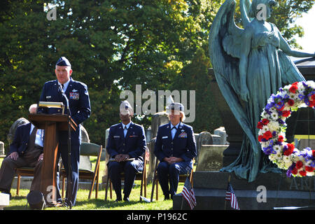 MENANDS, NY-- Brig Gen. Thomas J. Owens, assistant adjutant general for the New York Air National Guard, speaks about President Arthur and all of his accomplishments before placing a wreath at the tomb of President Chester Arthur, the 21st President of the United States who is buried in Albany Rural Cemetery on Oct. 5, 2016. The New York National Guard represents the White House in this event annually on the late president’s birthday. (U.S Army National Guard photo by Capt. Jean Marie Kratzer) Stock Photo