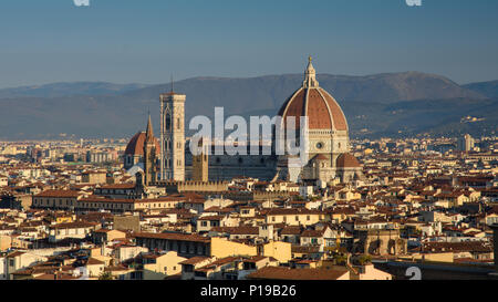 Florence, Italy - March 24, 2018: Morning light illuminates the cityscape of Florence, including the historic landmark of the Duomo cathedral.