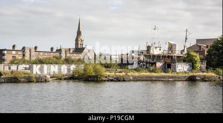 Dublin, Ireland - September 17, 2016: The Naomh Eanna, in derelict conditions, in the Grand Canal Dock in Dublin's Docklands district.