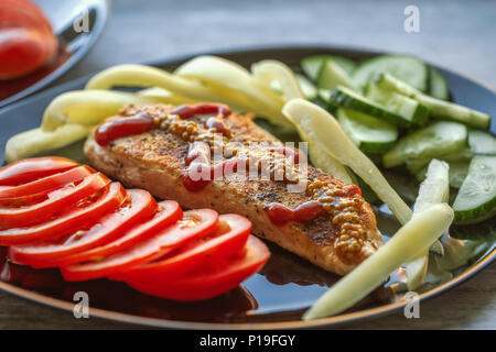 fresh fried chicken steak with pepper, onion and tomato on plate Stock Photo