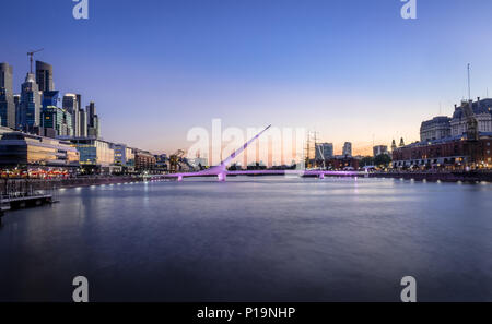 Panoramic view of Puerto Madero and Womens Bridge (Puente de la Mujer) at sunset - Buenos Aires, Argentina Stock Photo