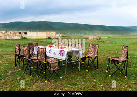 Having picnic near the road to Song Kol Lake, Naryn province, Kyrgyzstan, Central Asia Stock Photo