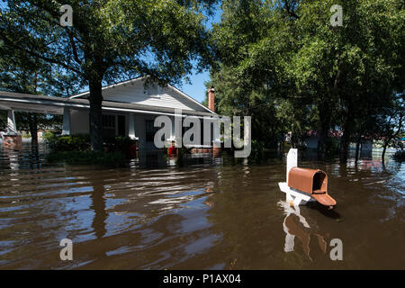 The Flooded town of Nichols S.C., heavy rains caused by Hurricane Matthew flooded the town which caused the evacuation of all its residents, Oct. 10, 2016. Governor Nikki Haley declared a State of Emergency Oct. 4, 2016 and the National Guard was called up to support state and county emergency management agencies and local first responders with coastal evacuations.  (U.S. Air National Guard photo by Tech. Sgt. Jorge Intriago) Stock Photo