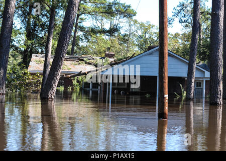 The Flooded town of Nichols S.C., heavy rains caused by Hurricane Matthew flooded the town which caused the evacuation of all its residents, Oct. 10, 2016. Governor Nikki Haley declared a State of Emergency Oct. 4, 2016 and the National Guard was called up to support state and county emergency management agencies and local first responders with coastal evacuations.  (U.S. Air National Guard photo by Tech. Sgt. Jorge Intriago) Stock Photo