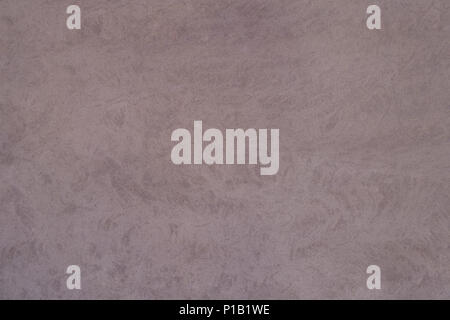 reddish grey cement stucco wall surface full frame backdrop Stock Photo