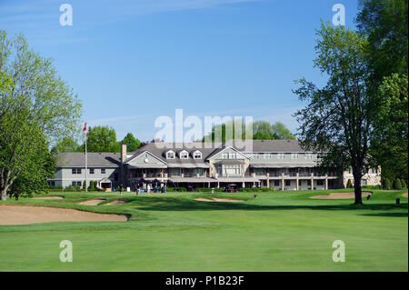 View of a green and of the expansive clubhouse of the exclusive Royal Montreal Golf Club, Ïle Bizard, province of Quebec, Canada. Stock Photo