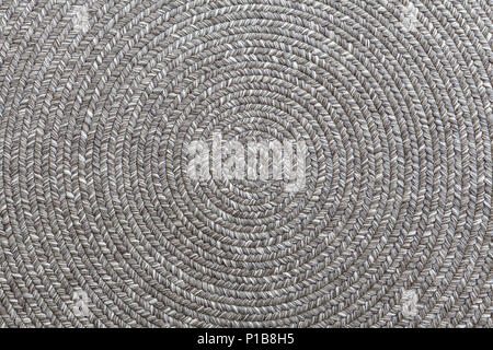Jute braided home spiral rug background texture pattern Stock Photo