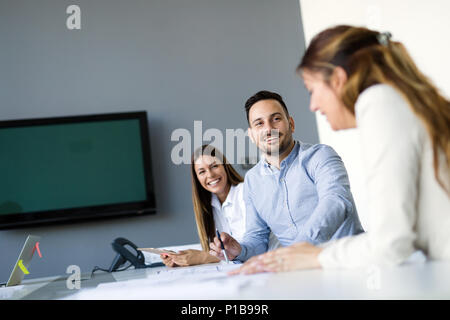 Group of architects working on project Stock Photo