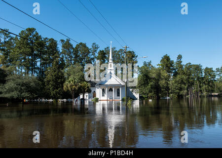 The Flooded town of Nichols S.C., heavy rains caused by Hurricane Matthew flooded the town which caused the evacuation of all its residents, Oct. 10, 2016. Governor Nikki Haley declared a State of Emergency Oct. 4, 2016 and the National Guard was called up to support state and county emergency management agencies and local first responders with coastal evacuations.  (U.S. Air National Guard photo by Tech. Sgt. Jorge Intriago) Stock Photo