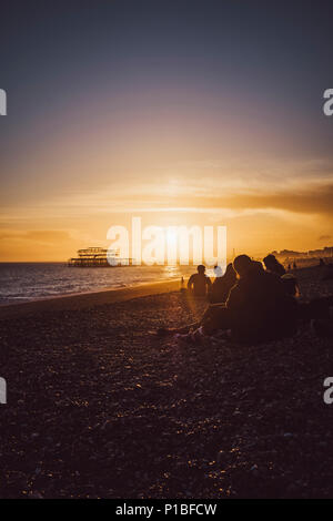 Burned West Pier by the sea, Brighton, England Stock Photo