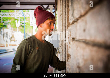 Blond handsome young man with wool hat Stock Photo