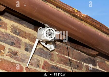 CCTV camera on outside of house, East Sussex, UK Stock Photo