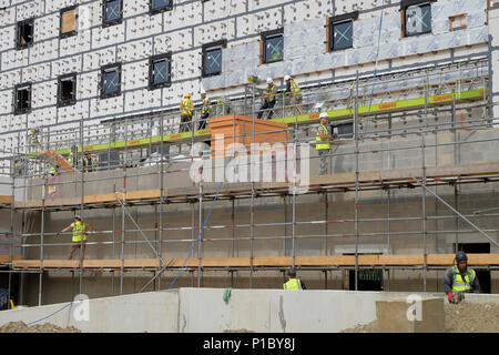 Construction workers on a building site, uk Stock Photo