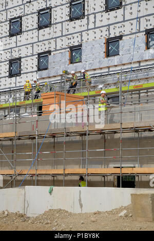 Construction workers on a building site, uk Stock Photo