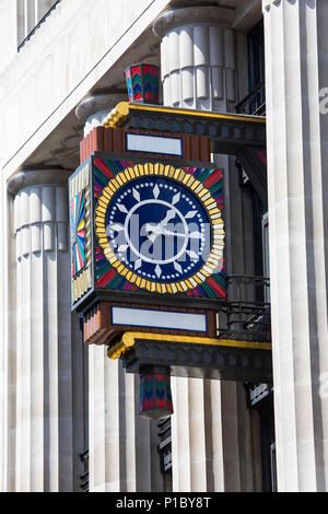 LONDON, UK - JUNE 6TH 2018: A close-up of the Art Deco style Clock on the exterior of Peterborough Court - the Former Daily Express building on Fleet  Stock Photo