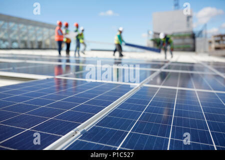 Solar panels at sunny power plant Stock Photo