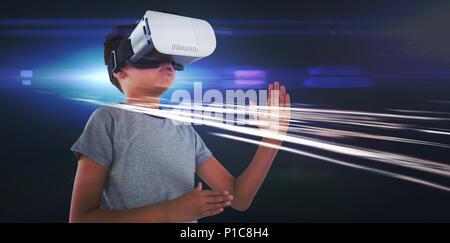 Boy playing using virtual reality headset Stock Photo