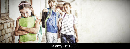 Pupil mocked in the school playground Stock Photo