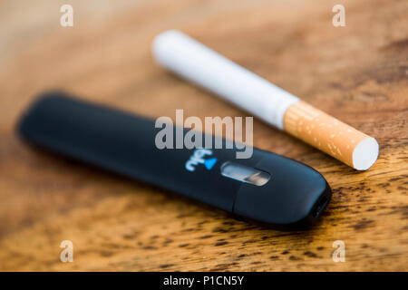 ILLUSTRATION - 6 June 2018, Hamburg, Germany: An e-cigarette by Reemtsma is  placed next to normal filter cigarettes. Photo: Malte Christians/dpa Stock  Photo - Alamy