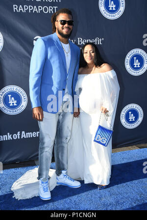 LOS ANGELES, CALIFORNIA, USA - AUGUST 08: Professional baseball pitcher Kenley  Jansen and wife Gianni Jansen arrive at Clayton Kershaw's 7th Annual Ping  Pong 4 Purpose Fundraiser held at Dodger Stadium on