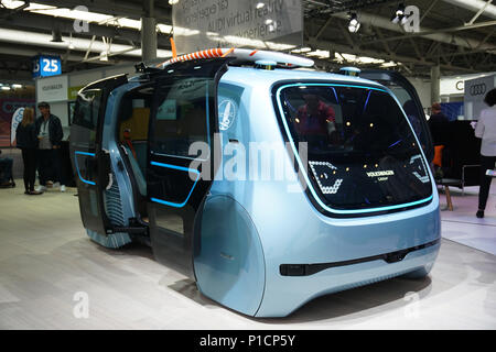 Hannover, Germany. 11th June, 2018. An unmanned electric vehicle of Volkswagen company is displayed during the CeBIT in Hannover, Germany, on June 11, 2018. The world's largest trade exhibition for computer technology CeBIT opened on Monday in Hannover. Credit: Wang Qing/Xinhua/Alamy Live News Stock Photo