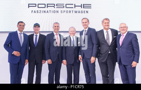 08 June 2018, Germany, Stuttgart: Michael Steiner (L-R), member of the board for Research and Development of Porsche AG, Andreas Haffner, member of the board for Human Resources and Social Service of Porsche AG, Albrecht Reimold, member of the board Production and Logistics of Porsche AG, Wolfgang Porsche, chairman of the Supervisory Board of Porsche AG, Oliver Blume, CEO of Porsche AG, Detlev von Platen, member of the board Sales and Marketing of Porsche AG, and Uwe-Karsten Staedter, member of the board Procurement of Porsche AG, stand next to each other during the celebration '70 years Porsc Stock Photo