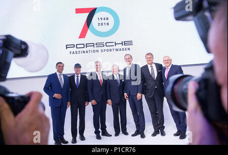 08 June 2018, Germany, Stuttgart: Michael Steiner (L-R), member of the board for Research and Development of Porsche AG, Andreas Haffner, member of the board for Human Resources and Social Service of Porsche AG, Albrecht Reimold, member of the board Production and Logistics of Porsche AG, Wolfgang Porsche, chairman of the Supervisory Board of Porsche AG, Oliver Blume, CEO of Porsche AG, Detlev von Platen, member of the board Sales and Marketing of Porsche AG, and Uwe-Karsten Staedter, member of the board Procurement of Porsche AG, stand next to each other during the celebration '70 years Porsc Stock Photo