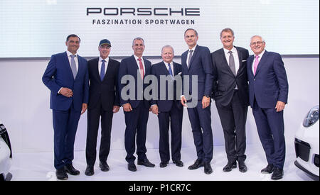 08 June 2018, Germany, Stuttgart: Michael Steiner (L-R), member of the board for Research and Development of Porsche AG, Andreas Haffner, member of the board for Human Resources and Social Service of Porsche AG, Albrecht Reimold, member of the board Production and Logistics of Porsche AG, Wolfgang Porsche, chairman of the Supervisory Board of Porsche AG, Oliver Blume, CEO of Porsche AG, Detlev von Platen, member of the board Sales and Marketing of Porsche AG, and Uwe-Karsten Staedter, member of the board Procurement of Porsche AG, stand next to each other during the celebration '70 years Porsc Stock Photo