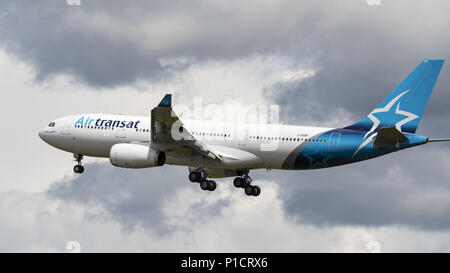 Richmond, British Columbia, Canada. 10th June, 2018. An Air Transat Airbus A-330-200 (C-GUBF) wide-body jet airliner, painted in the airline's new-look livery, airborne on final approach for landing. Credit: Bayne Stanley/ZUMA Wire/Alamy Live News Stock Photo