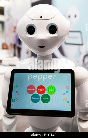 Hannover, Germany. 11th June, 2018. CEBIT 2018, international computer expo and Europe's Business Festival for Innovation and Digitization: Pepper, interactive humanoid robot, companion and personal robot, manufactured by company SoftBank Robotics. Credit: Christian Lademann/Alamy Live News Stock Photo