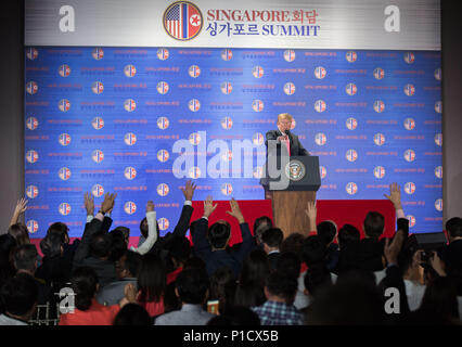 Singapore. 12th June, 2018. U.S. President Donald Trump speaks during a press conference in Singapore on June 12, 2018. Credit: Zhu Hongye/Xinhua/Alamy Live News