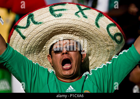 Preview of the first match of the German national football team at the FIFA World Cup 2018 in Russia: On 17.06.2018, the team of Jogi Loew meets Mexico in Mexico, Mexican fan with Mexican hat, sombrero, headdress, group A preliminary round, Mexico (MEX) - Uruguay (URU) 0.1, on 22/06/2010 in Rustenburg Football World Cup 2010 in South Africa from 11.06. - 11.07.2010 | usage worldwide Stock Photo