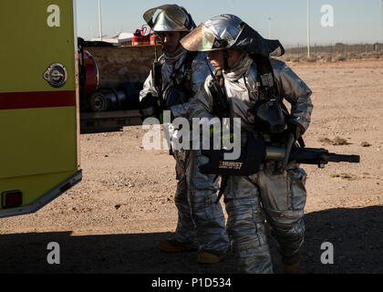Marine Corps ARFF members at MCAS Yuma, Arizona use the Jaws of Life ...