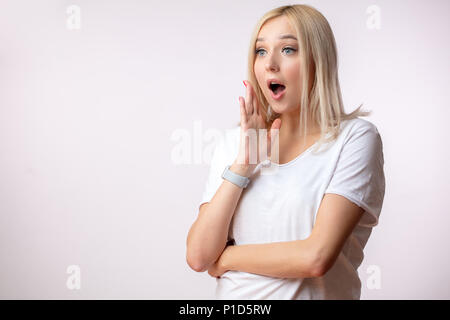 scared woman with fair hair calling emergency service, police Stock Photo