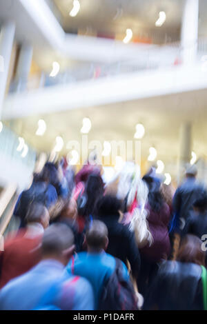 Blurred motion business people ascending stairs Stock Photo