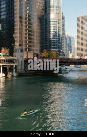 People kayaking on the main stem of the Chicago River in downtown Chicago. Stock Photo