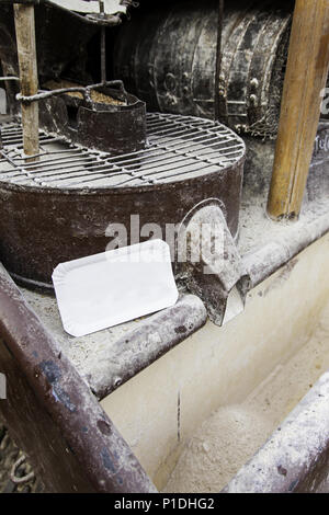Old mill for grinding cereals, traditional production of arina Stock Photo