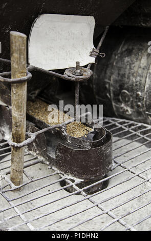Old mill for grinding cereals, traditional production of arina Stock Photo