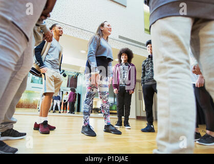 Teenagers talking in dance class studio Stock Photo
