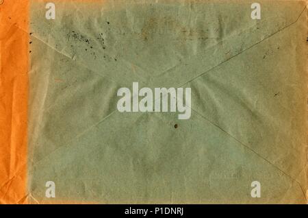 Back of an old used envelope. Rich stain and paper details. Can be used as background. Stock Photo