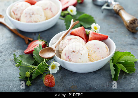 Strawberry ice cream in white bowls Stock Photo