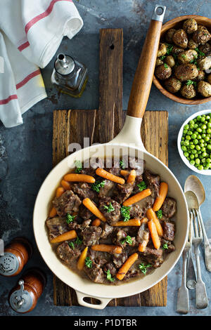Beef stew with carrots and parsley Stock Photo